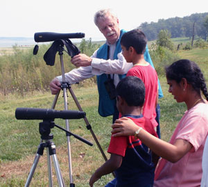 Helping a family observe pelicans